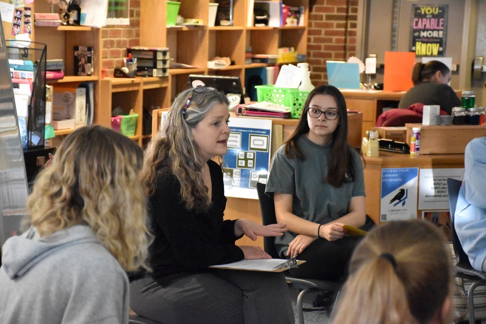 Rebecca Rio is pictured in the accompanying photograph giving a training on restorative practices to high school students last year. 