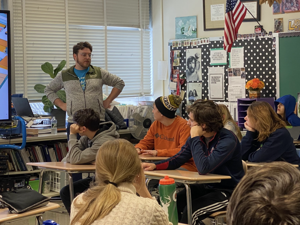 Avon alumnus Collin Hayes talks to Mrs. Cordula Kennell’s creative writing students about his career as an associate editor for General Code during a Nov. 18 presentation. 