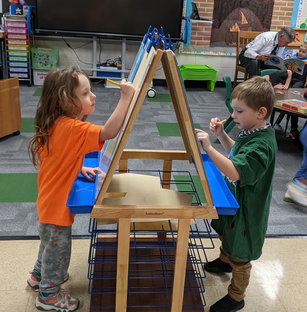 Photo courtesy of Sara Brown: Students in Mrs. Sara Brown’s pre-kindergarten class are pictured making drawings during a recent art time. 