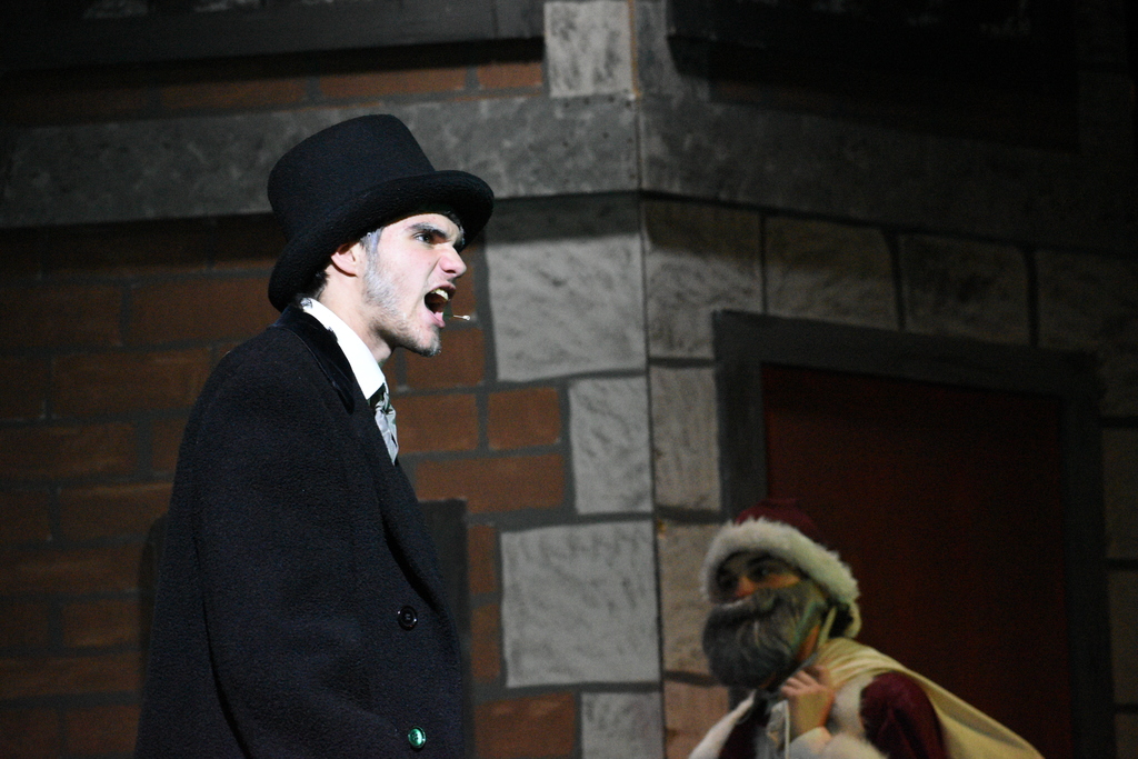 Members of Avon Theatre Program’s production of “Scrooge!” run a scene during a recent dress rehearsal. 