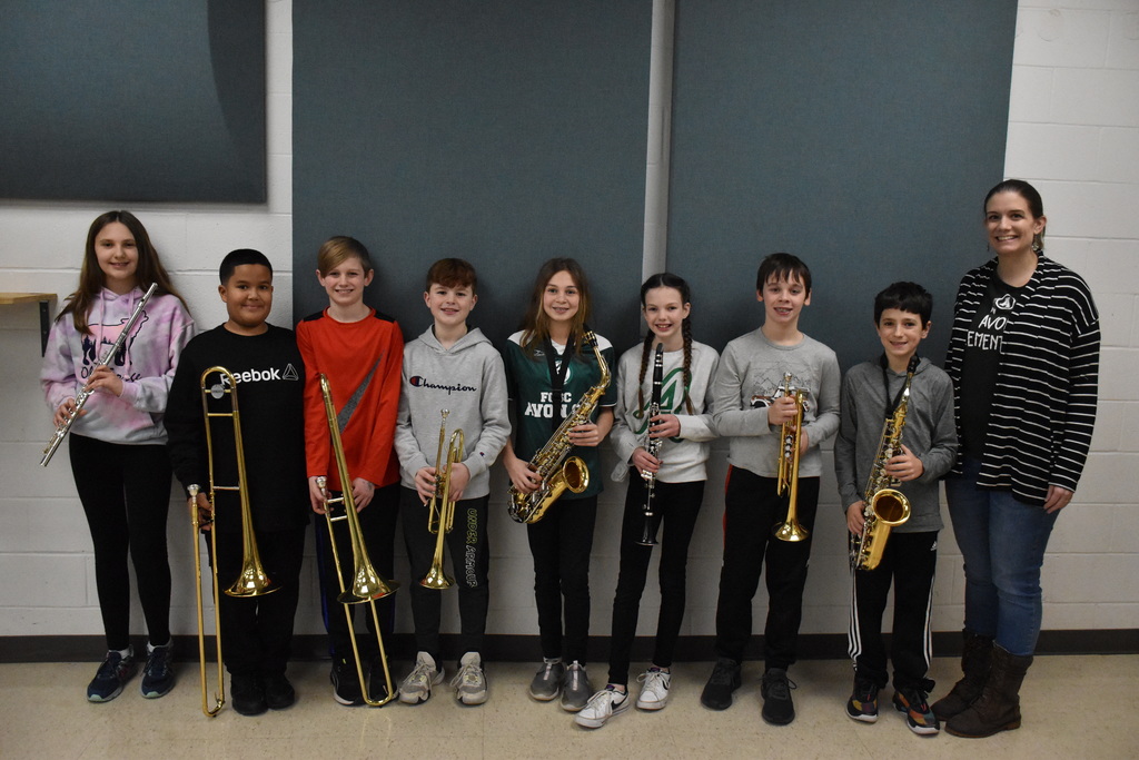 All-county 5/6 Band members are pictured with Instrumental Music Teacher Meaghan Stambaugh Friday morning before departing for Perry. 