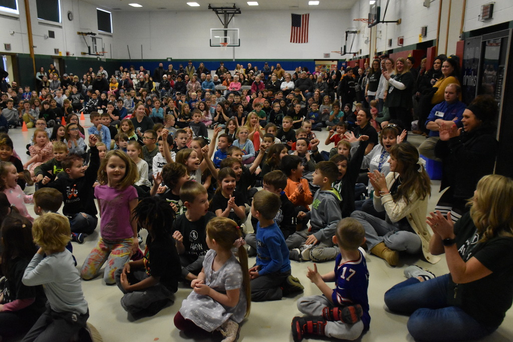 Mrs. Jennifer Leonard’s first grade class celebrates winning the Avon Elementary School’s Great Kindness Challenge Friday during the Braves Leaders of the Month Assembly. 