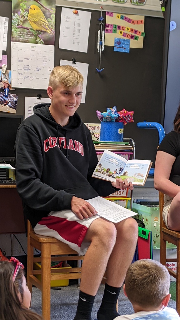 Mrs. Cordula Kennell’s creative writing students are pictured reading children’s books they created to Elementary School students earlier this week. 