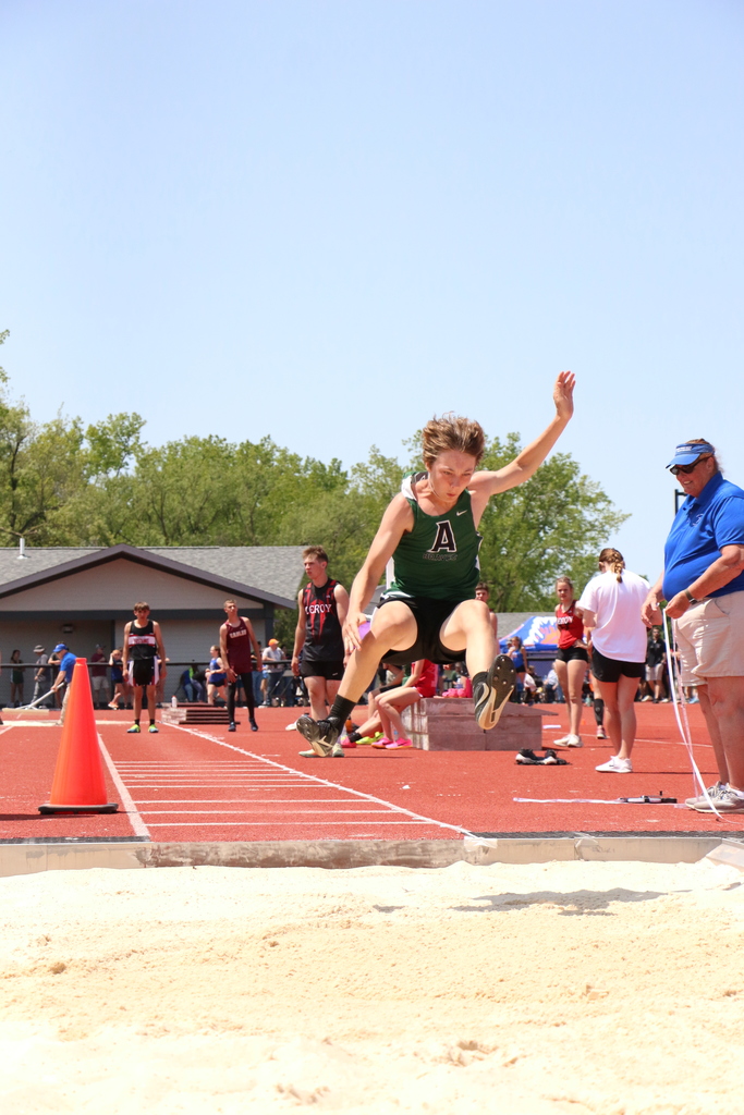 Avon track and field athletes are pictured competing at the Section V Class B2 Championships in Attica this past weekend. 